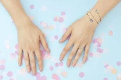 LUISIA® Spiral Armreif "Fjella" mit zwei Kristallen von Swarovski® - Silber / Lotus Pink Delite